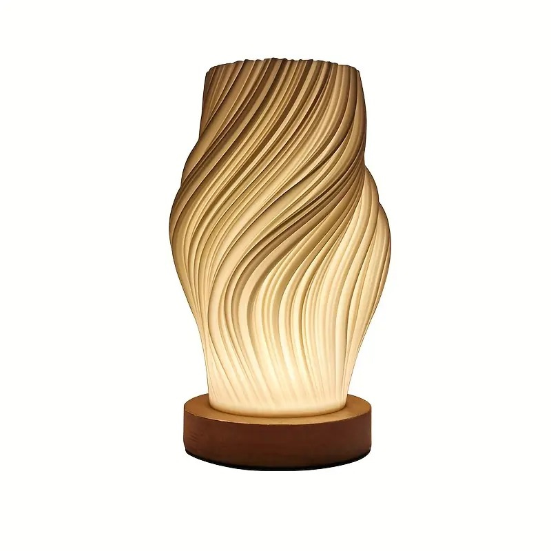 Cremefarbene moderne LED-Tischleuchte mit Metallfuß und 3D-Wellendesign