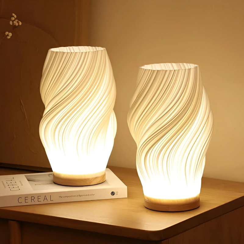 Cremefarbene moderne LED-Tischleuchte mit Metallfuß und 3D-Wellendesign